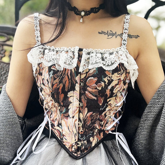 Modny gorset w stylu vintage z wielokolorowym wzorem kwiatowym, ozdobnymi wiązaniami bocznymi i delikatnymi koronkowymi detalami na ramiączkach, idealny jako top.